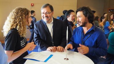 Dean of Physical Sciences Miguel García-Garibay (center) and Atmospheric & Oceanic Sciences graduate student David Gonzalez (right) speak with a first-year Physical Sciences student at the 2018 Welcome to Physical Sciences event reception