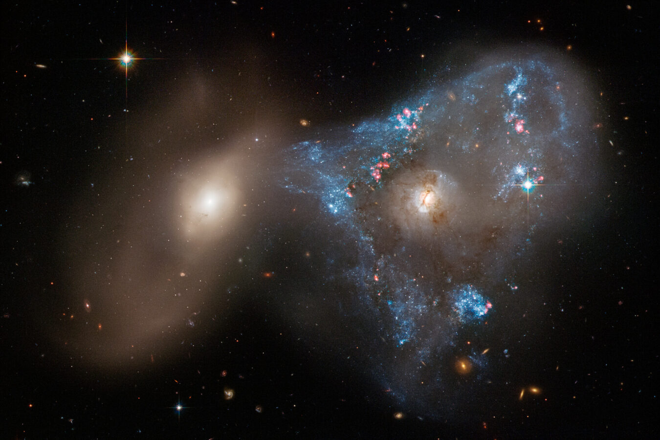 Galaxy Collision Creates 'Space Triangle' in New Hubble Image.