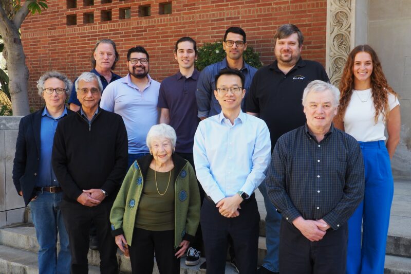 Members of UCLA's MAG lab pose in front of the Geology building at UCLA