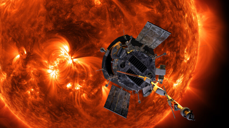 Artist’s rendition of the Parker Solar Probe, a short cylindrical object with solar panels and antennae sticking out, and a shield on the backside facing the sun. The background consists of the sun with swirling surface structures and the corona visible in detail.