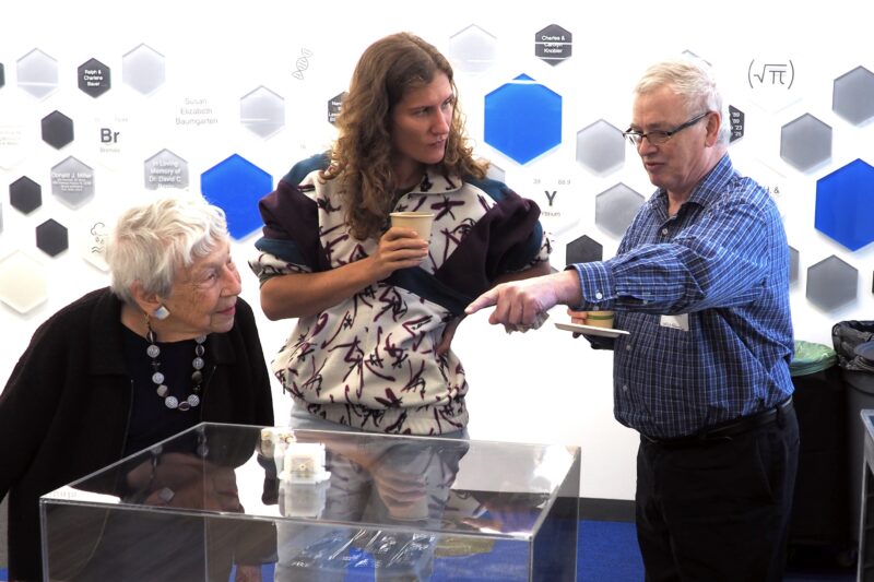 Attendees being shown demonstrations from researchers about new materials at the event