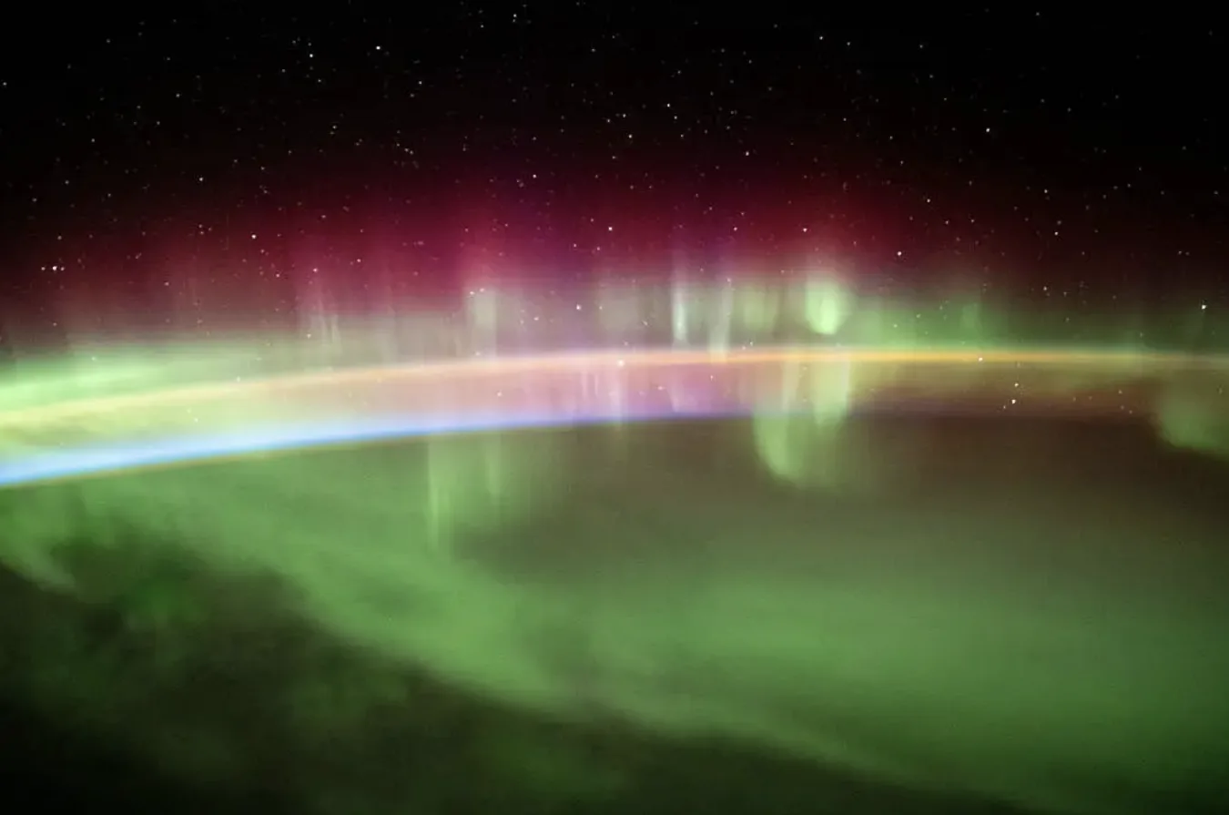 colorful aurora lights over earth's atmosphere