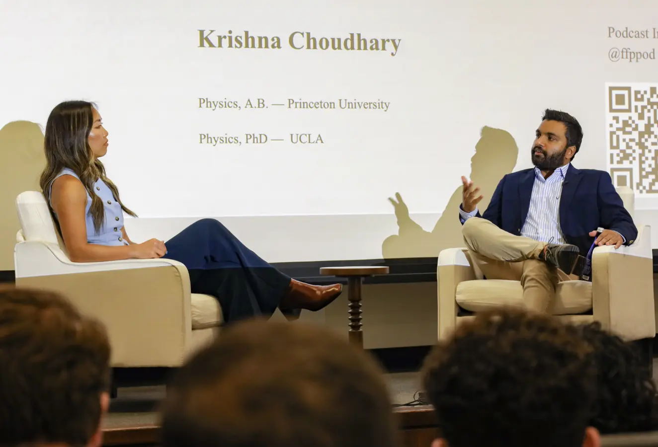 Sherry Peng sits on stage with Krishna Choudhary for a discussion